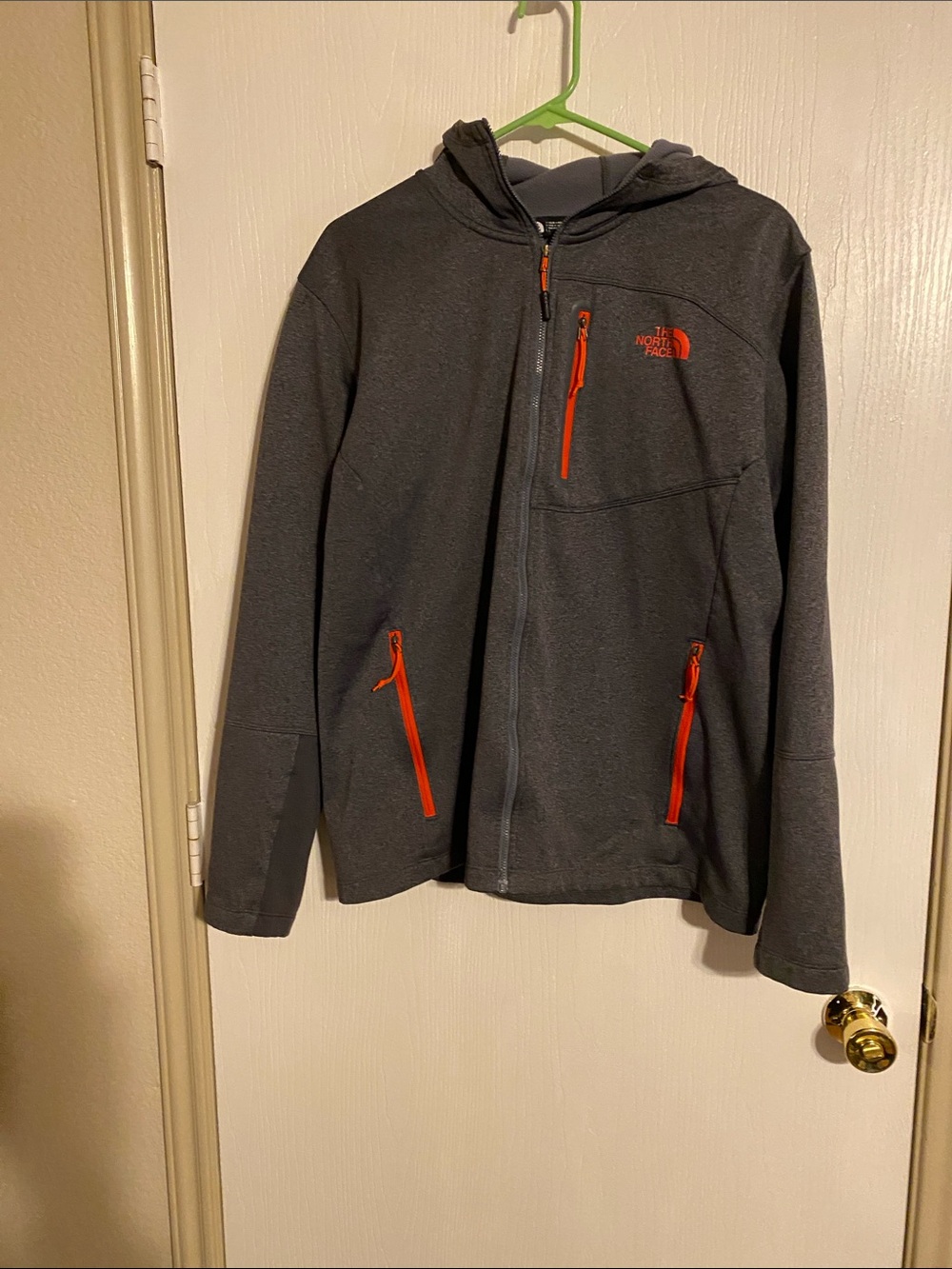 The North Face Men's Dark Gray Hooded Jacket with Orange Zippers